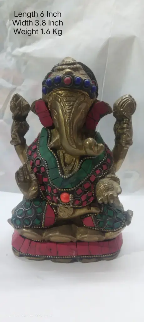 Statue Of Lord Ganesha Shows Indian Tradition Made Up Of Pure Brass And Have A weight Of 1600 Gram Have Stone Work On It. A Home Decor Item.