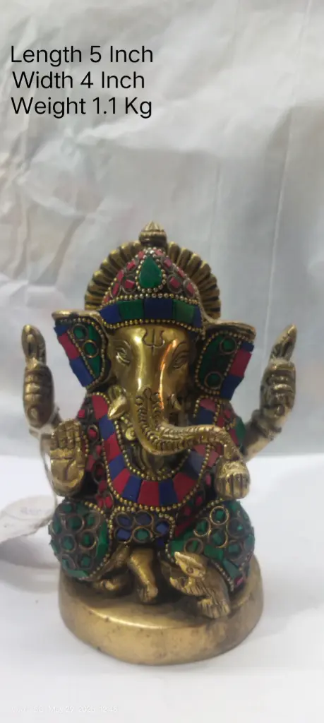 Statue Of Lord Ganesha Shows Indian Tradition Made Up Of Pure Brass And Have A weight Of 1100 Gram Have Stone Work On It. A Home Decor Item.