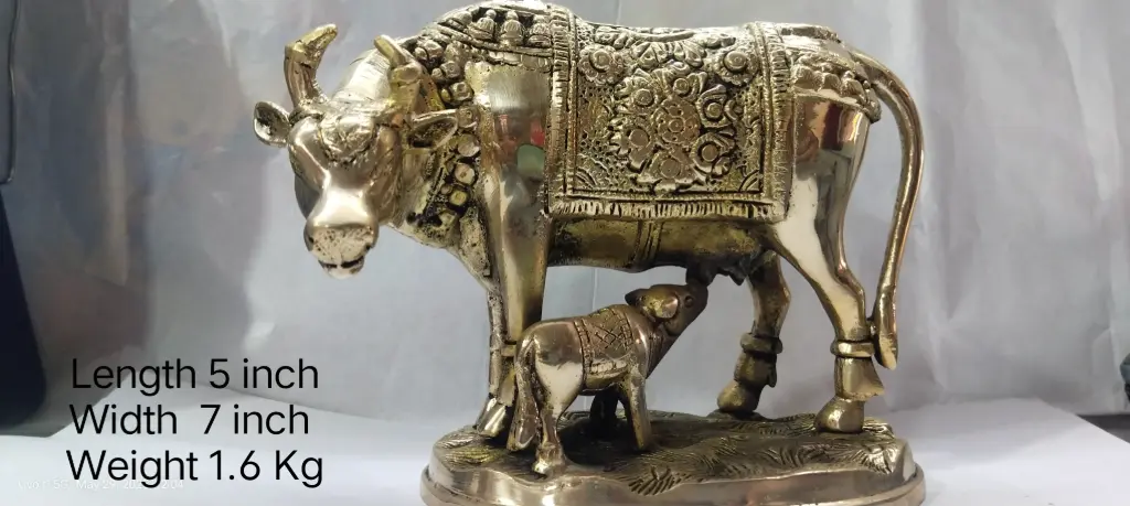 Cow With Calf Made Up Of Brass Have A Weight of 1600 Grams It is Also Called Nandi A home Decore Product