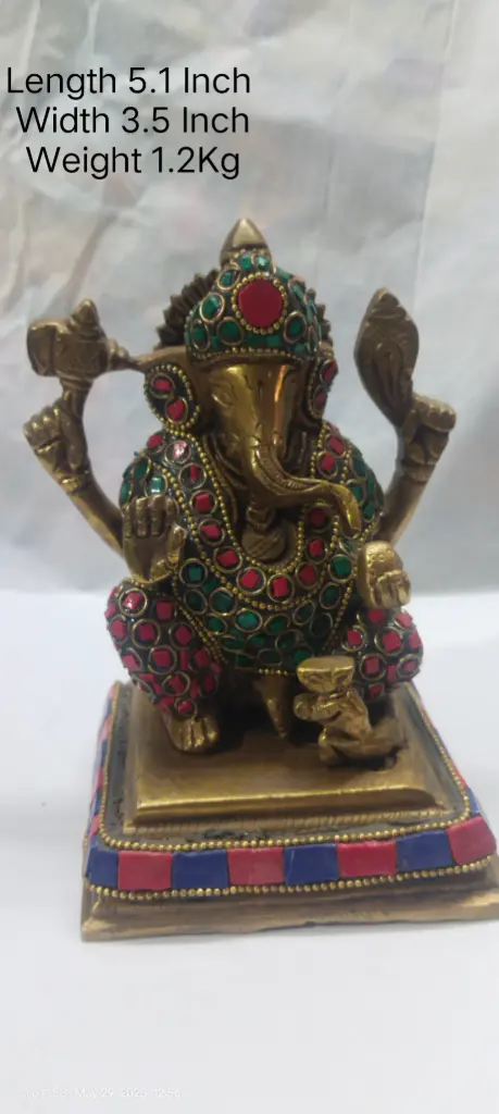 Statue Of Lord Ganesha Shows Indian Tradition Made Up Of Pure Brass And Have A weight Of 1200 Gram Have Stone Work On It. A Home Decor Item.